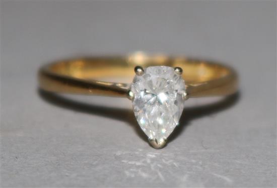 A diamond solitaire ring, the pear-shaped stone approximately 0.46ct, 18ct yellow gold shank.